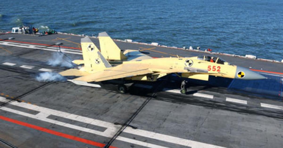 China's Flanker Fighter Goes To Sea; New Versions Planned