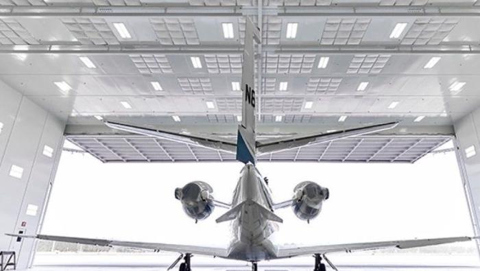 flyexclusive aircraft in a hangar