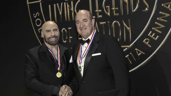 John Travolta and Mark Burns