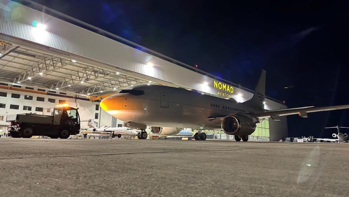 Open doors of maintenance hangar at Nomad Technics 