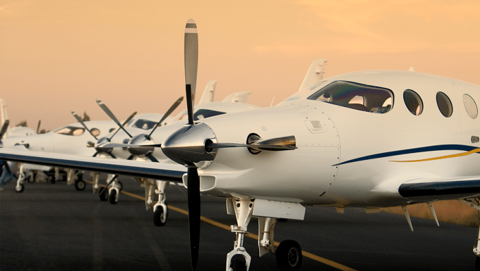 Several Epic E1000 aircraft lined up on a ramp