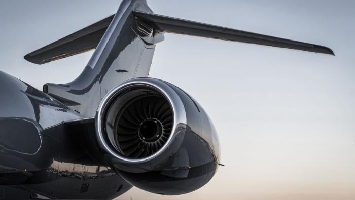 Close up of Global 6000 tail and engine in sunset 