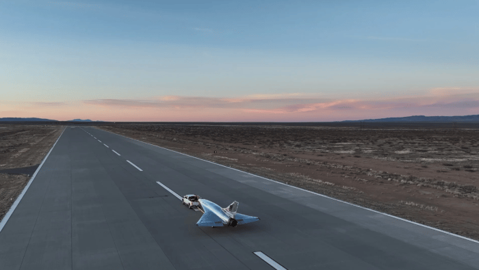 Quarterhorse Mk 2.1 being towed out to runway at sunrise
