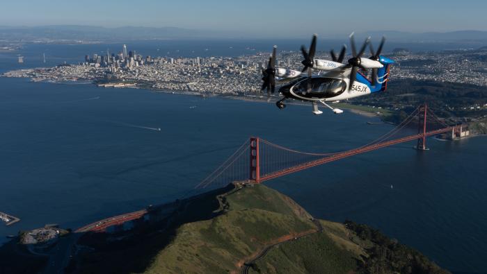 Joby's eVTOL aircraft flies over the Golden Gate Bridge