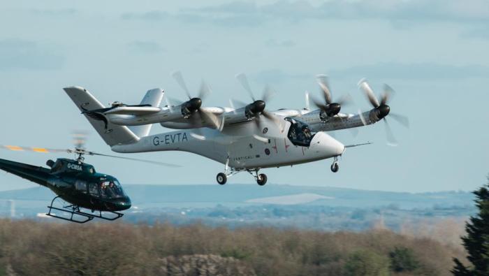 Vertical VX4 flying with chase helicopter 