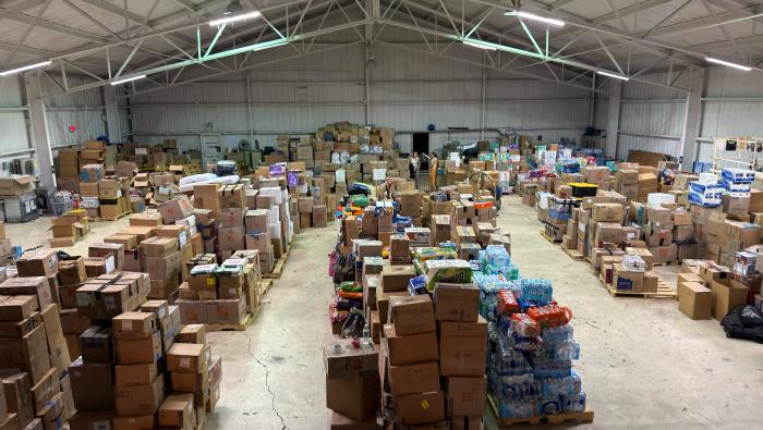 W Aviation hangar filled with relief supplies for Venezuela