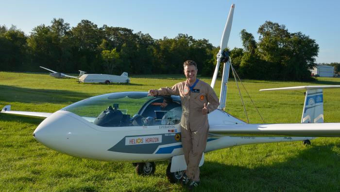 Helios Horizon founder and chief test pilot Miguel Iturmendi stands with his modified Pipistrel Taurus