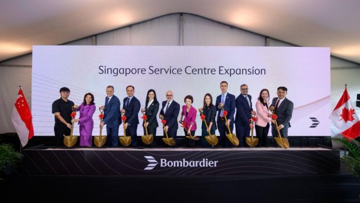 Bombardier staff and others celebrating ground breaking of Singapore expansion