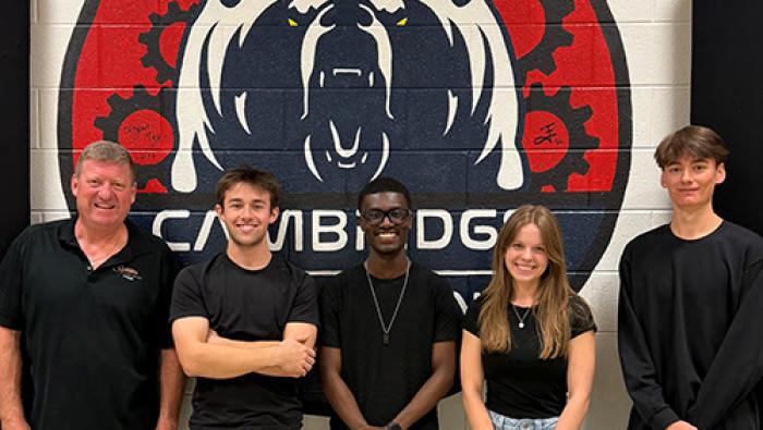 2026 GAMA Aviation Design Challenge first-place team from Cambridge High School Porter High School (from left to right: John Friske (teacher) Clark Benner, Christian Seawright, Morgan Smith and Adam Gould).