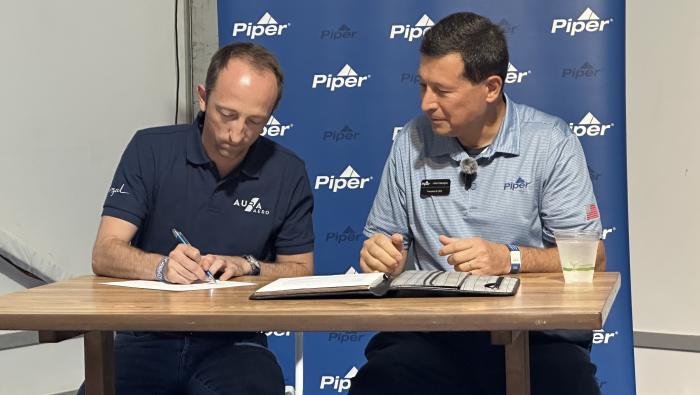 Aura CEO Jeremy Caussade and Piper Aircraft president and CEO John Calcagno