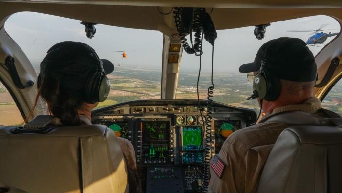 pilot and student in helicopter