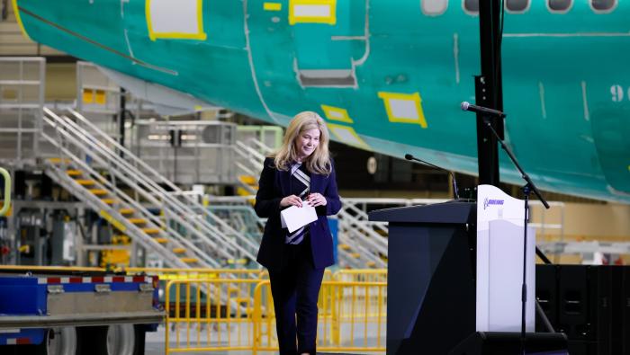Stephanie Pope, president and CEO of Boeing Commercial Airplanes, walks off stage at the ceremonial opening of Everett's North Line on July 10.