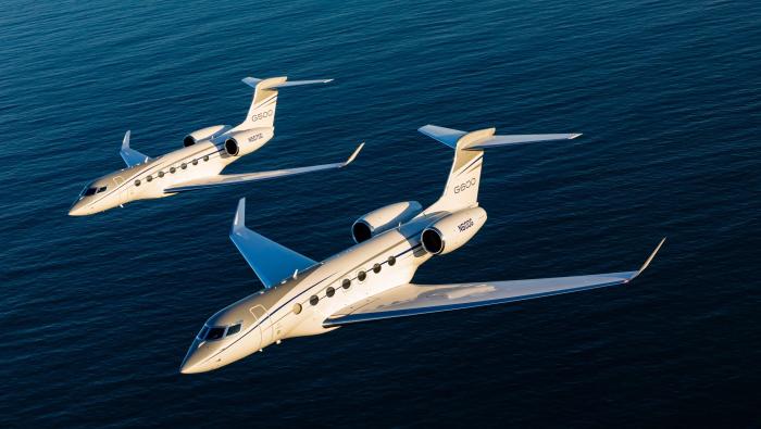 A G500 and a G600 in flight over water