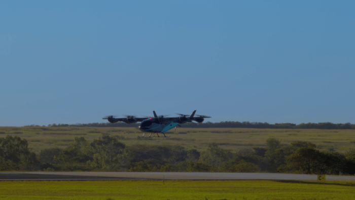 Eve prototype hovering above runway 