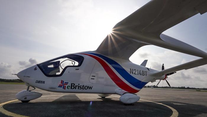 Alia CX300 on tarmac with Bristow logo on rear fuselage 