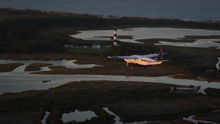 Joby’s autonomous Cessna Grand Caravan flies past Bodie Island Lighthouse