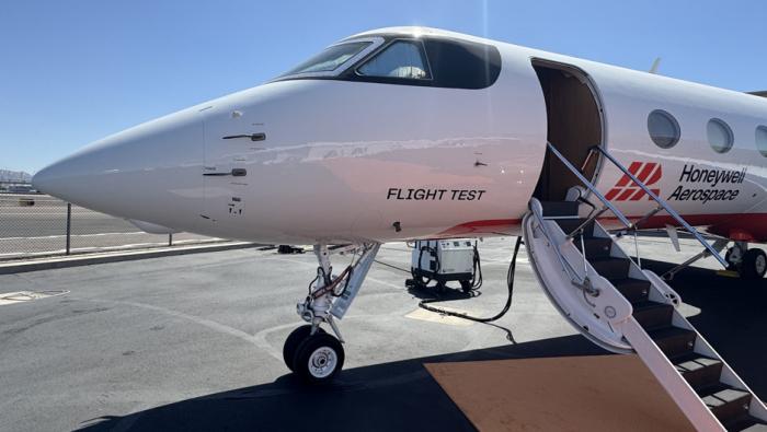 A Honeywell Aerospace flight-test jet parked on an airport ramp