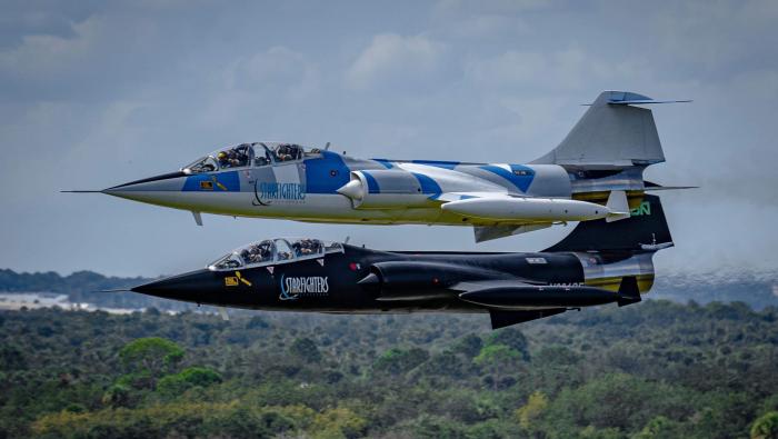 Two Starfighters Space F-104s in flight 