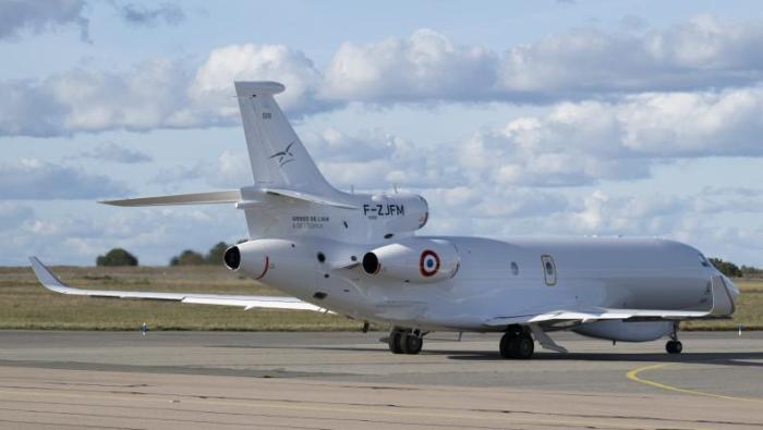 Modified grey Falcon 8X on tarmac 