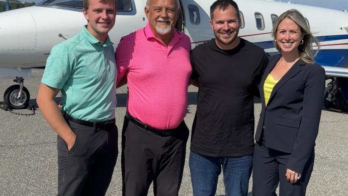 (from left to right) Hanson Communications Dominick and Bruce Hanson (both pilots), patient Michael, and Courtney Easton, v-p of CANy 