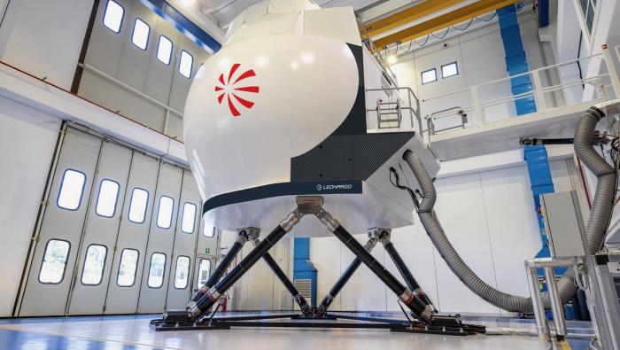 Full-flight simulator in building with Leonardo branding on side