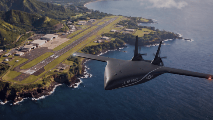 Kona blended wing body graphic over coastline