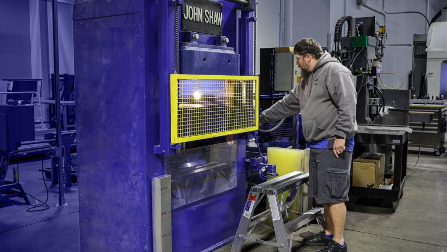 Duncan Aviation John Shaw rubber pad press