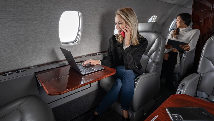 Gogo women on laptop, tablet, smartphone, headphones
