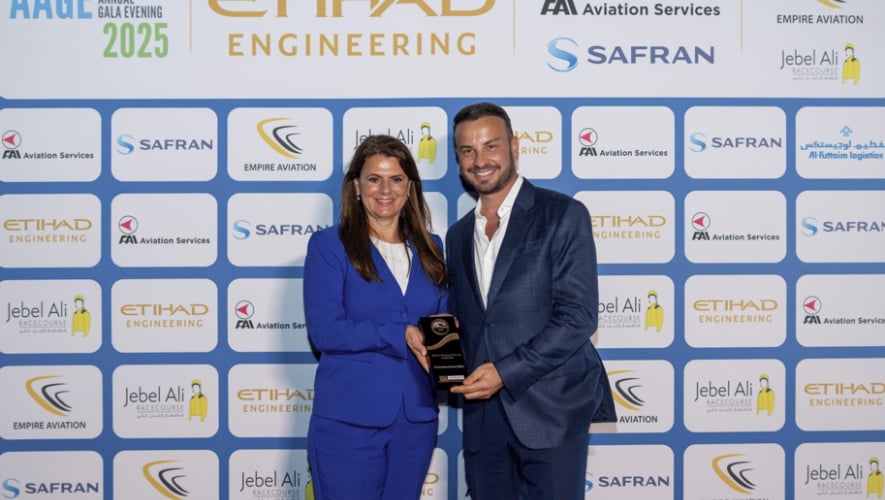 FAI's Barbara Baumgartner and Michael Axtmann with the award