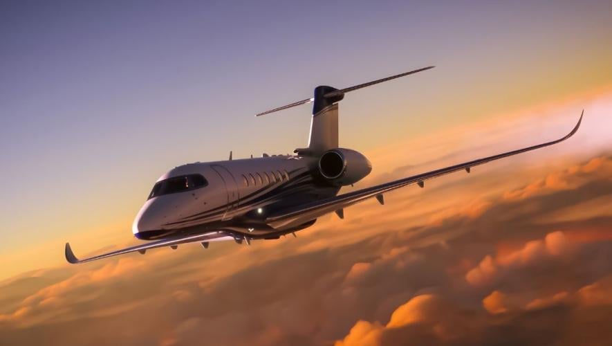Business jet in flight against clouds 