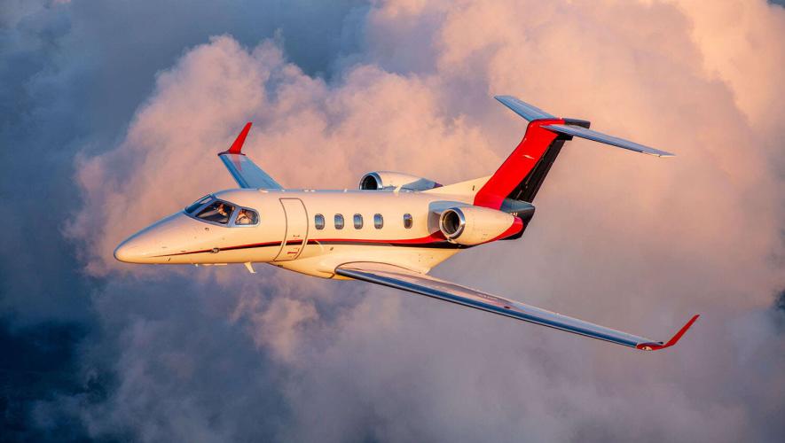 Phenom 300 flying through clouds