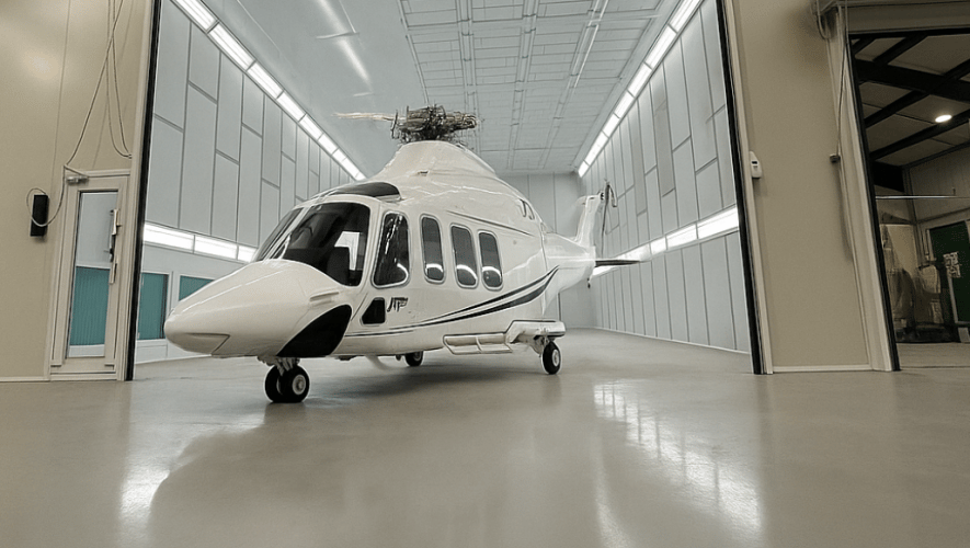 White helicopter in white room 