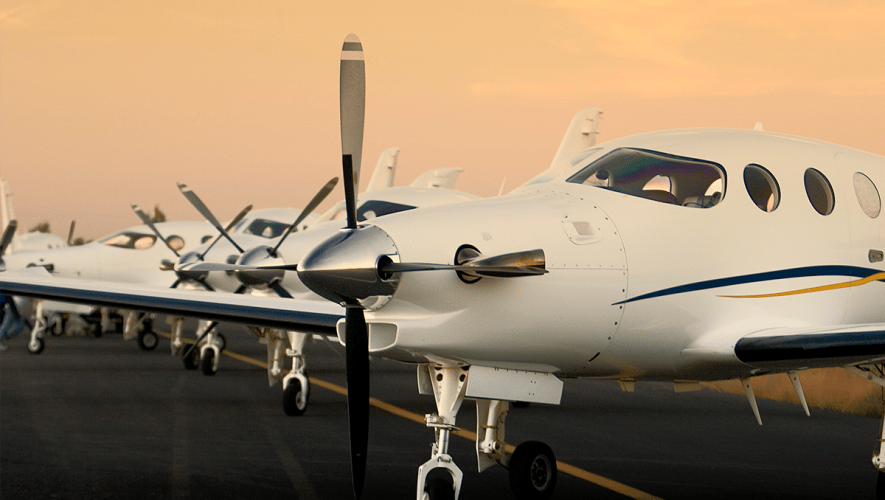 Several Epic E1000 aircraft lined up on a ramp