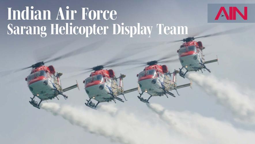 Four helicopters in formation from Sarang Indian Air Force display team