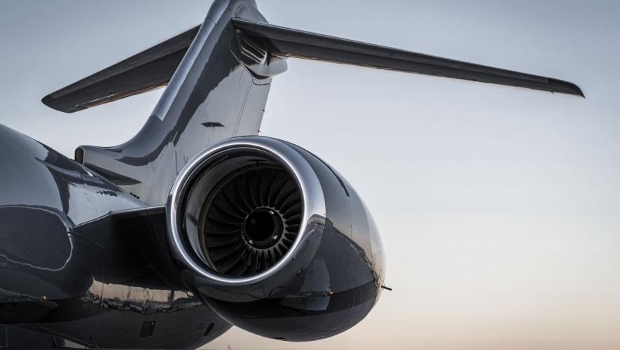 Close up of Global 6000 tail and engine in sunset 