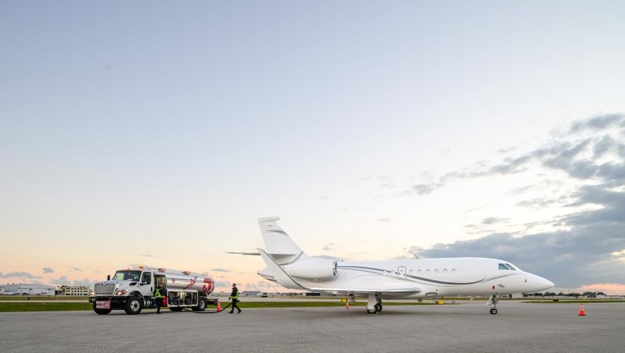 Avfuel tanker on ramp with business jet