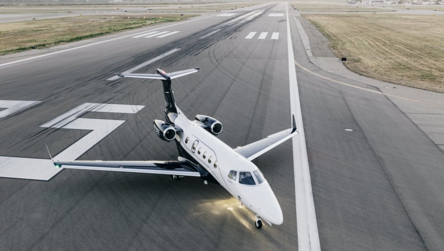 Phenom 300 on a runway