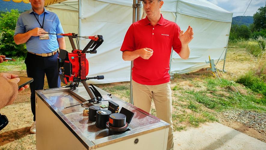 Drone on a table while representative explains 