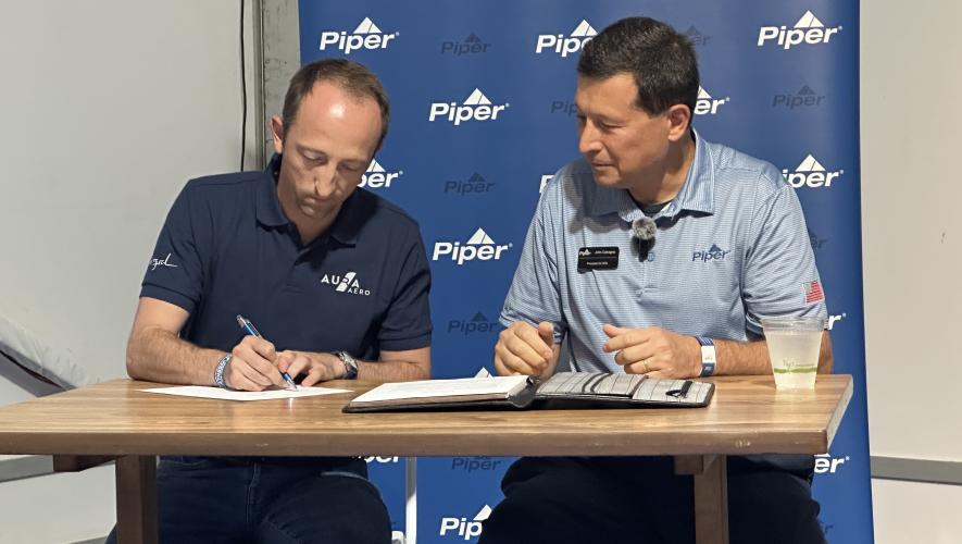 Aura CEO Jeremy Caussade and Piper Aircraft president and CEO John Calcagno