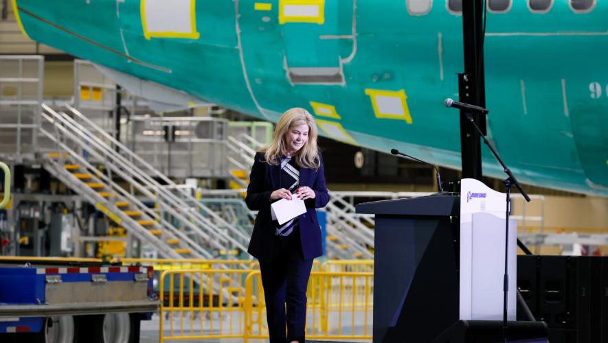 Stephanie Pope, president and CEO of Boeing Commercial Airplanes, walks off stage at the ceremonial opening of Everett's North Line on July 10.