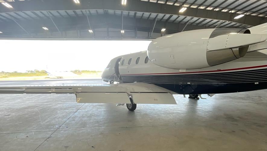 business jet in hangar