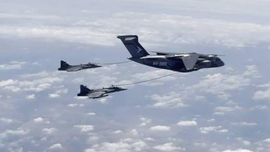 KC-390 with two Gripen receiving fuel mid-air 