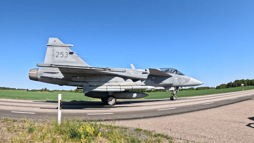 Gripen taxiing down road 