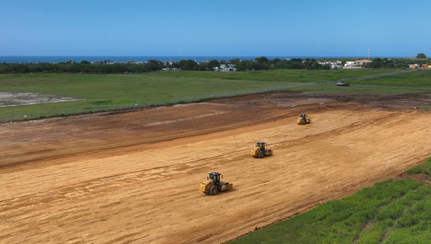 Compaction rollers on runway bed at Aguadilla