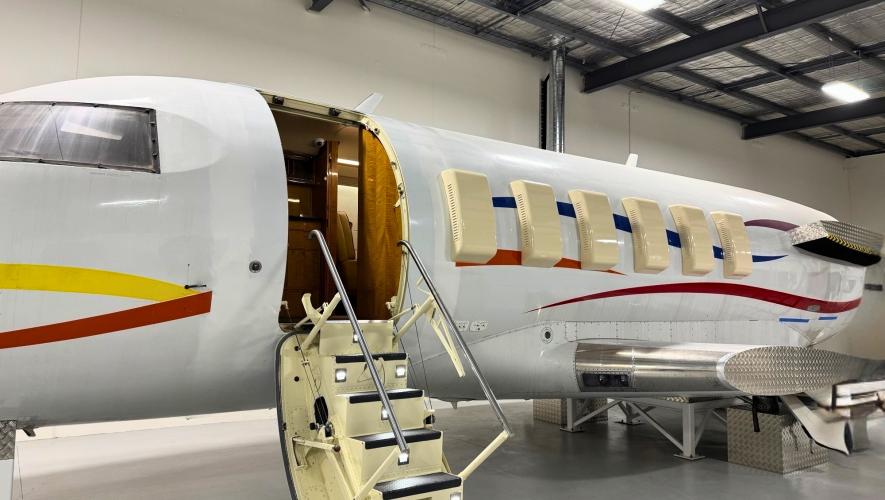 Modified business jet fuselage in hangar 