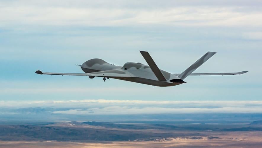 drone in flight above desert 