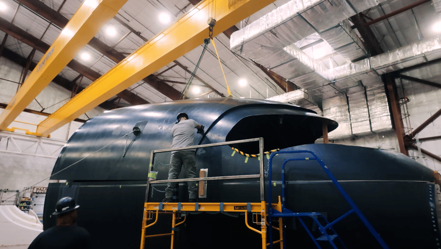 A Scaled Composites technician works on a composite section of JetZero’s Jet1 demonstrator in Mojave, California.