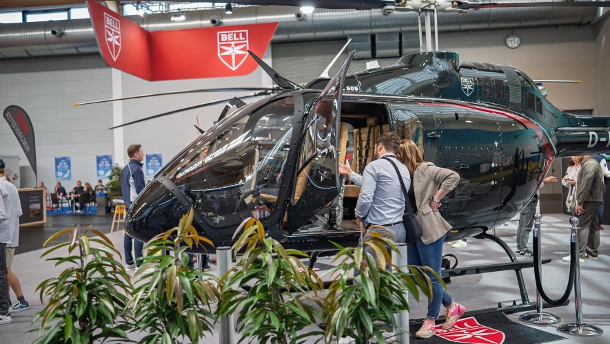 Bell helicopter on static display in exhibition hall 