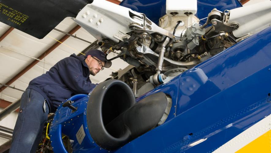 Summit Aviation technician with engine