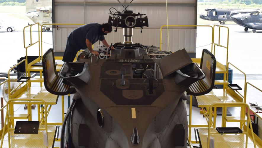 Summit Aviation technician with helicopter